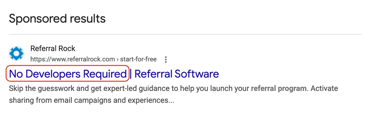 Google Ad for referral software with 'no developer required' positioning