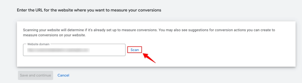Google Ads screen prompting the user to enter a website URL to measure conversions, with a field for the domain.
A red arrow points to the “Scan” button beside the URL input box.