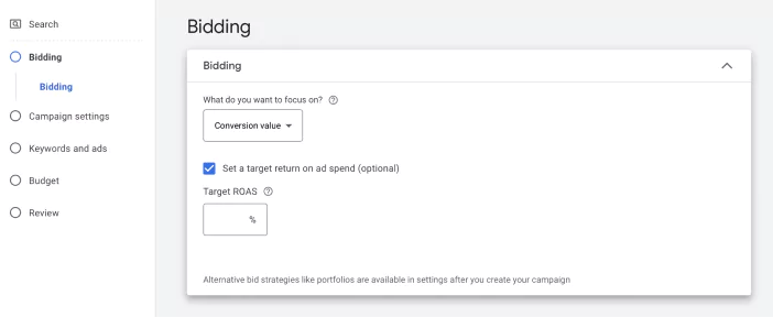 Google Ads Campaign Setup Screenshot at the bidding stage showing How tROAS is a bid strategy under the maximize conversion value bid strategy, an automated bid strategy