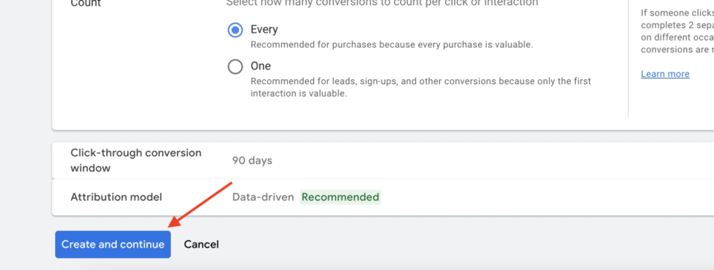 Google Ads conversion settings page with attribution model and window settings.
A red arrow points to the blue “Create and continue” button.