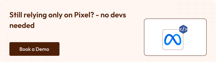 A banner with the text "Still relying only on Pixel? – no devs needed" on the left, and a brown button below that says "Book a Demo." On the right, there’s an icon showing the Meta logo with a code symbol, indicating integration without developer support.
